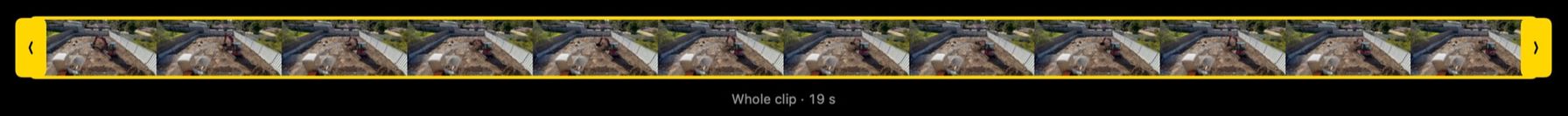 Mac filmstrip of an excavator working on the site, inside a yellow trim frame labelled Whole clip.